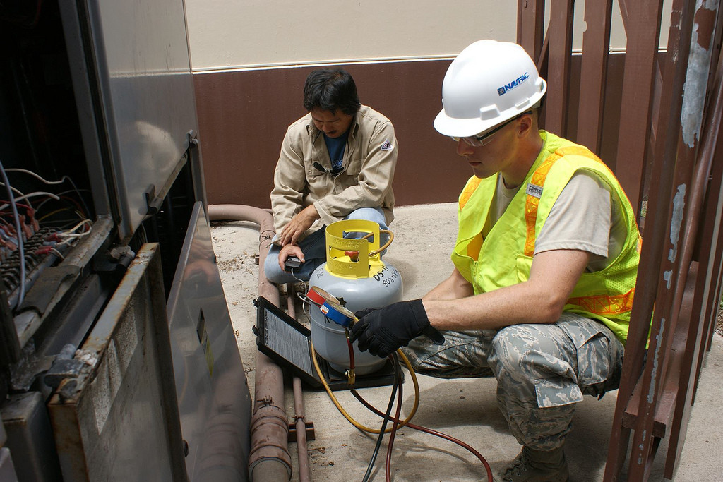 HVAC Specialists do the check-up for maintenance.